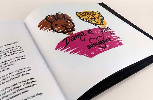 Libro Dama y Amo 3 Plano detalle de página interna del libro “Dama y Amo 2 - Eternidad” escrito por Julio Resek, ilustrados por Fado. Edición bilingüe. Escrita en castellano y guaraní. Dirección de Arte. Empresa Constructora Resek. Posadas, Misiones.